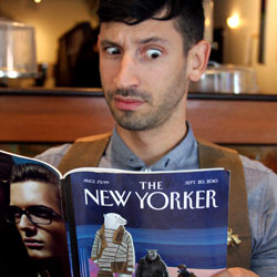 A bemused Joshua Katcher reads the Style issue of The New Yorker. (Source: MRNY)