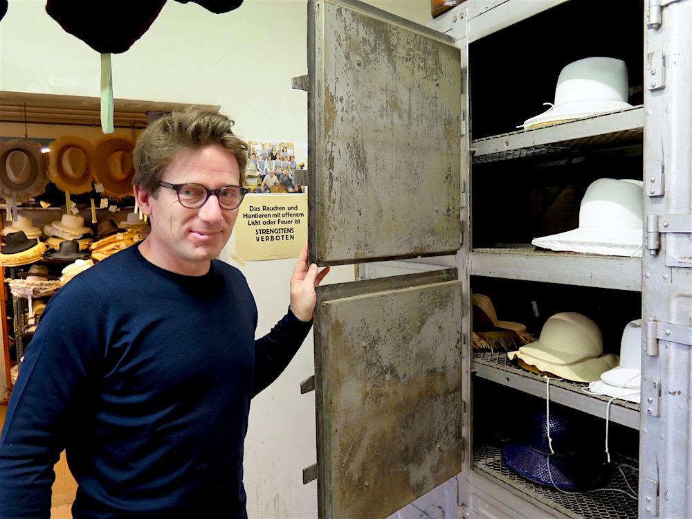 Klaus Mühlbauer in front of the "hat oven" at the Mühlbauer atelier in central Vienna (photo by ©MRNY)